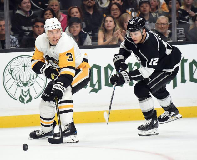 Jack Johnson (left) playing for the Pittsburgh Penguins in this file photo: Photo: Getty Images