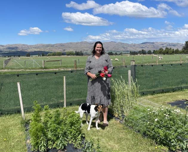 Farm environmental consultant Josie Murray in the flower garden of her Hakataramea Valley home,...
