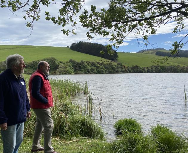 Ecotago Charitable Trust scientists Andrew Innes (left) and Dr Murray Vickers discuss the water...