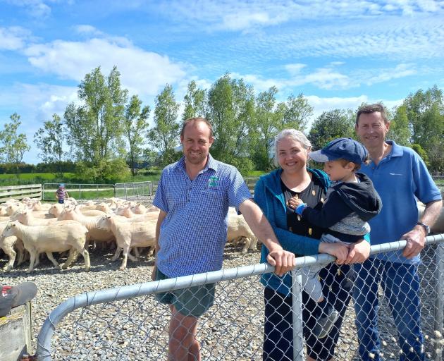 Pete Gardyne (left) with his wife Esther, holding youngest son Aaron, 3, and Trevor Potter...