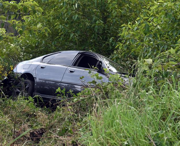 A car ended up down a bank.