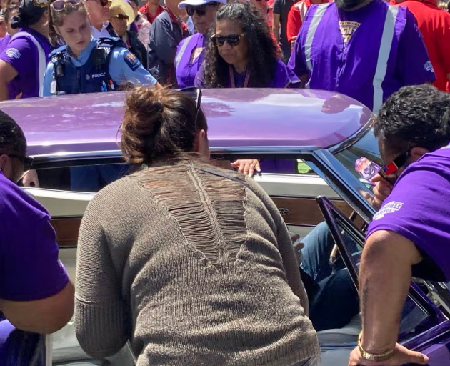 The Avondale Santa parade was stopped after a BurgerFuel car collided with a brass band.