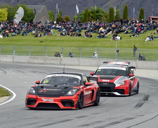 Tony Quinn powers the Quinns’ GT4 Porsche on to the main straight during the race.