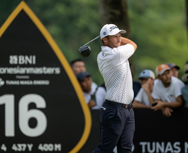 Ben Campbell tees off on the 16th hole during the final round of the Indonesian Masters at the...