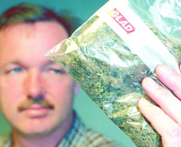 Then Det Sgt Inglis, holding a bag of marijuana, was in the organised crime-drug squad in the...