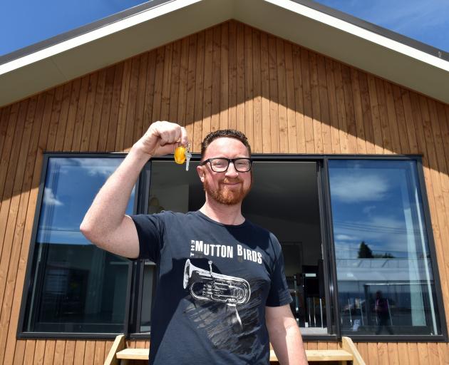 Nigel Maxwell, of Mosgiel, has the keys to a new house after a charity auction in Dunedin on...
