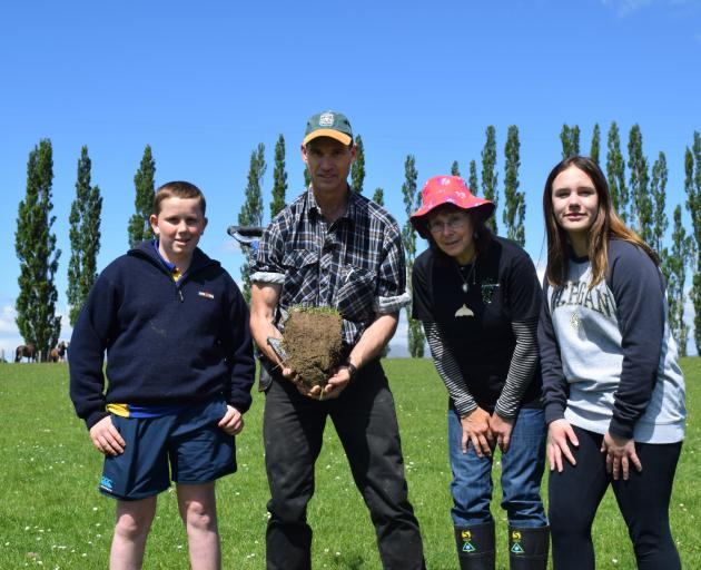 Inspecting a soil profile on an Enviroschools field trip in South Otago last week are (from left)...