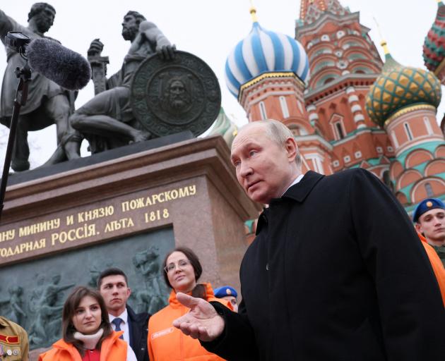 Russian President Vladimir Putin speaks with members of public associations, youth and volunteer...