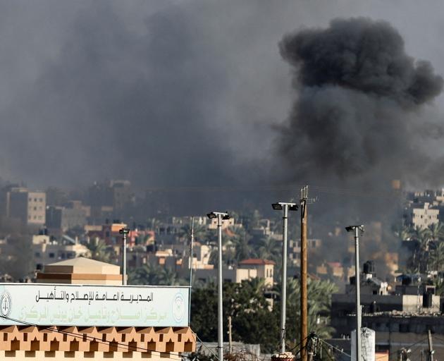 Smoke rises after an Israeli airstrike in Khan Younis on Saturday. Photo: Reuters 