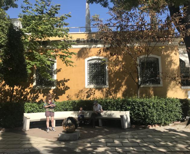 The palazzo, painted warm gold, houses a splendid 20th century art collection.