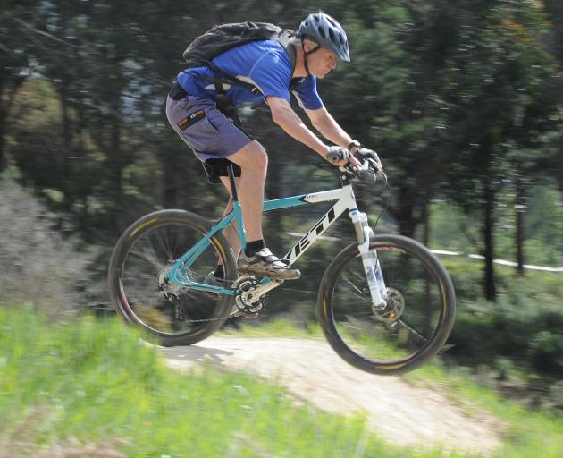 Seaton makes his way down the Signal Hill track. PHOTO: PETER MCINTOSH