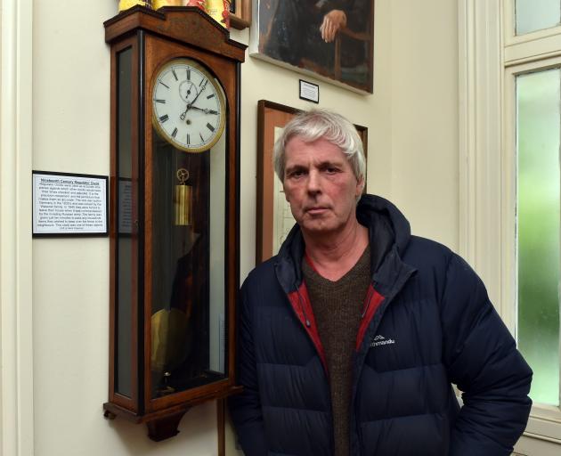 Dunedin Museum of Natural Mystery curator Bruce Mahalski showcases a regulator clock that dates...