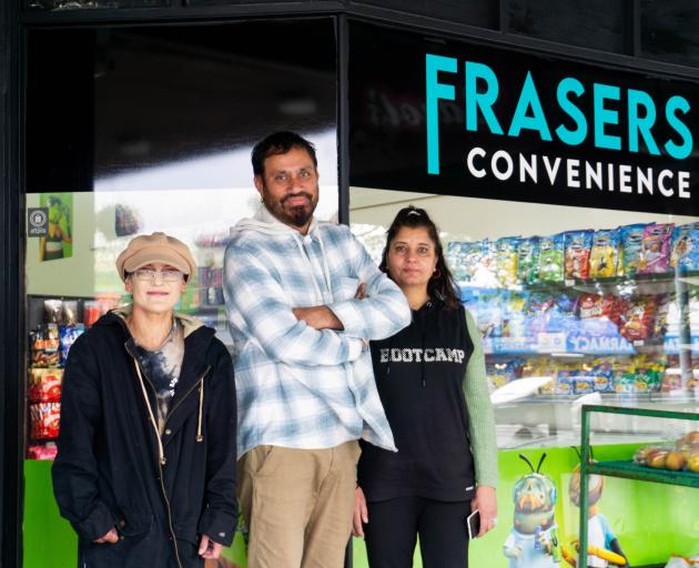 Outside the new Frasers Convenience store are, from left, manager Mellissa Taylor and owners...