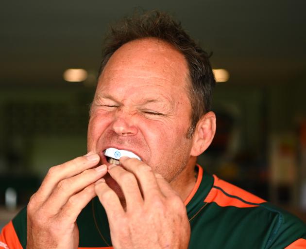 Former All Black Josh Kronfeld wears and tests a Prevent Biometrics mouthguard which measures the...