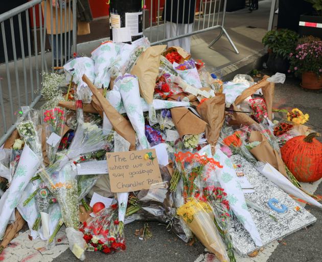 Tributes and flowers for Matthew Perry at the 'Friends' apartment building in the West Village,...