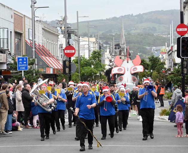 The Mosgiel Brass Band marches down George St.