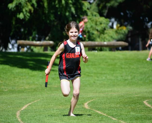 Seven-year-old Zoe Fowler competes for Geraldine in the relay race.