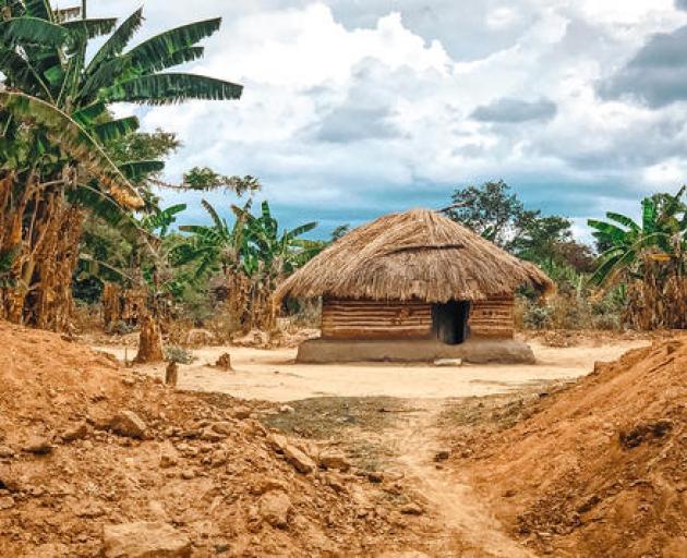 A common site on the road were mud and thatched roof huts like this one in Zambia. Photo: Supplied