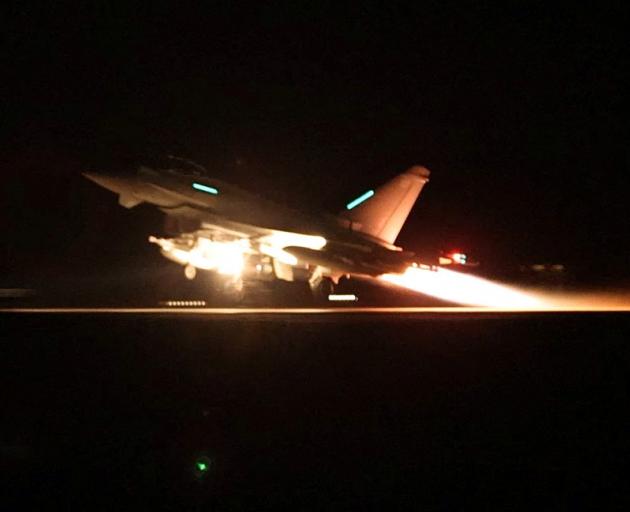 An RAF Typhoon aircraft takes off to join the US-led coalition from RAF Akrotiri, in Cyprus, to...