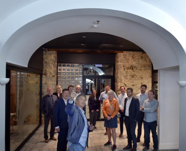 Animation Research founder Sir Ian Taylor (centre) shows people some of the completed restoration...