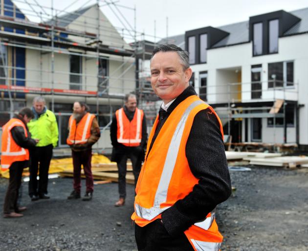 Green Party co-leader James Shaw checks Dunedin’s Toiora High Street Co-housing development with...