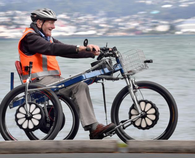 Gerard Oskam takes his home-built mobility trike for a test run on the Otago Harbour cycleway...
