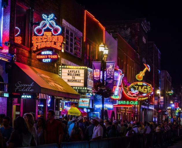Neon signs in Nashville’s renowned country music entertainment district Lower Broadway. PHOTOS:...