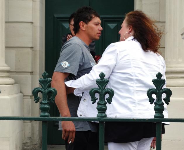 Joshua Chellew speaks with Zara Blackie’s mother outside the Oamaru District Court in 2019. PHOTO...