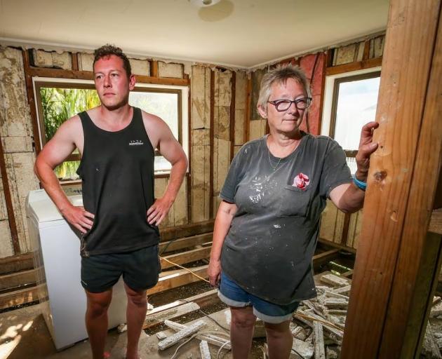 Hayden Downer and Maria Hollingshead cannot access insurance money for repairs to their Pākōwhai...