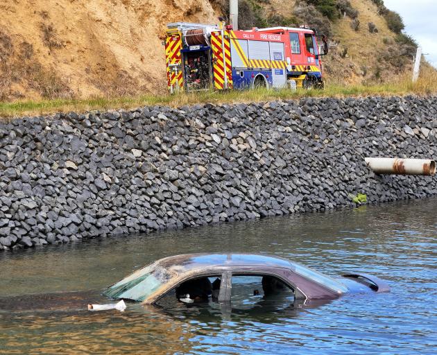 Fire and Emergency New Zealand respond to the scene of a car that was discovered in the Otago...