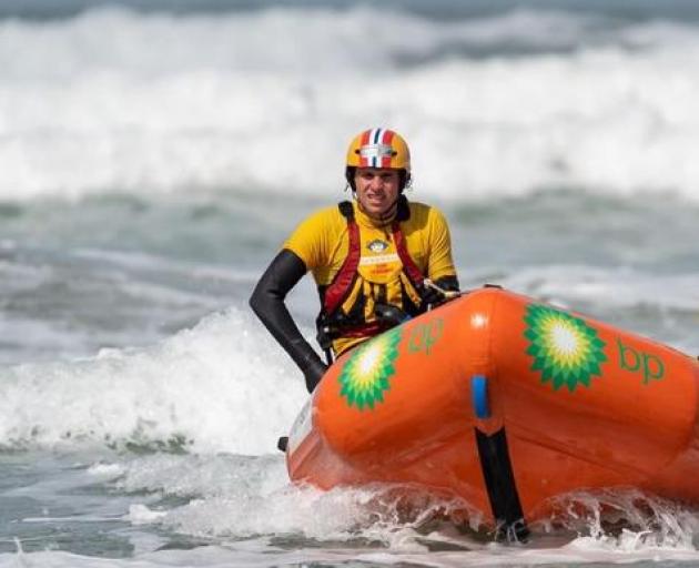 Taylors Mistake surf lifesaver Will Simmons in a club inflatable rescue boat. ​PHOTO: SUPPLIED