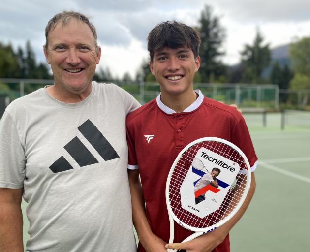 Tennis coach Mark Milburn with his fast-improving 17-year-old son, Kai. PHOTO: PHILIP CHANDLER