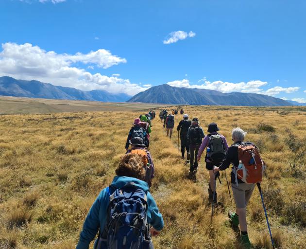 Participants in the 2020 Otago Goldfield Heritage Trust Cavalcade head over Mt St Bathans to...