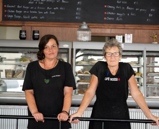 Cafe Rossi manager Krystal Scott (left) and cook Margaret Jenkins inside an empty cafe. The...