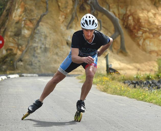 Dunedin speed skater Andrew Nicholson roller-blading through Portobello training for the ice....