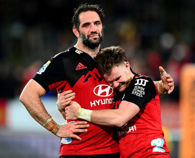 Mitchell Drummond shows Sam Whitelock how much he will be missed. Photo: Getty Images