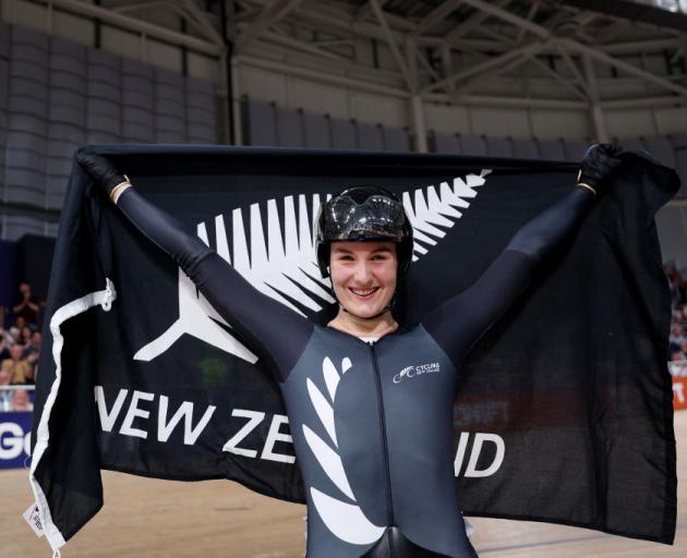 Ellesse Andrews celebrates winning the gold medal during the women’s keirin final at the 2023...