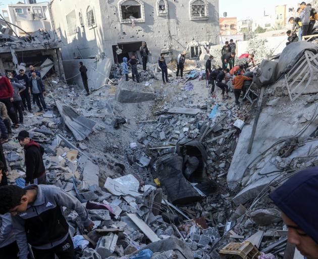 The aftermath of an overnight bombing in the southern Gaza Strip. PHOTO: GETTY IMAGES