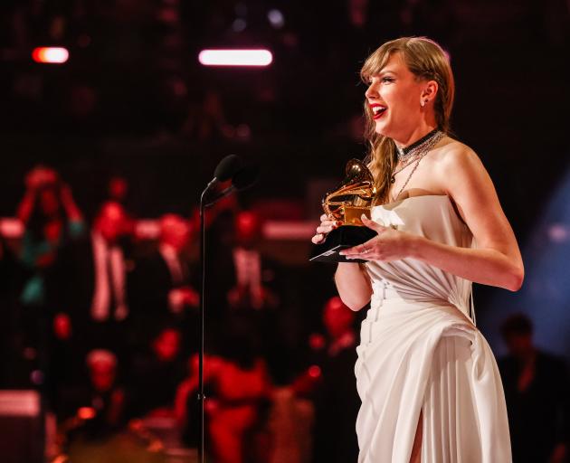 Taylor Swift hade history by winning her fourth album of the year award the Grammy Awards. Photo:...