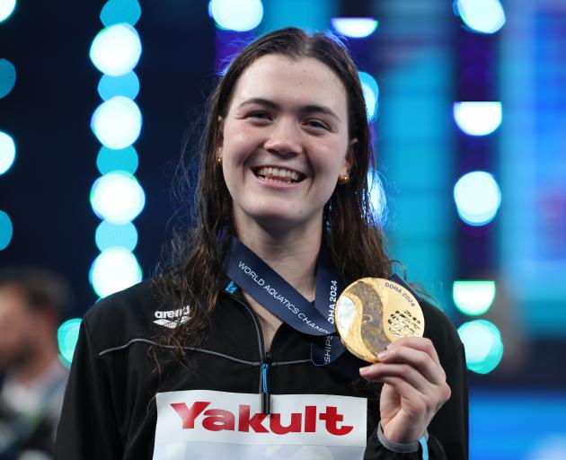 Erika Fairweather with her gold medal at the World Aquatic Championships in Doha. Photo: Getty...