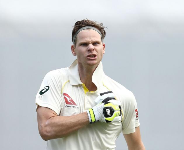 Steve Smith celebrates a century during the first test against England in Brisbane in 2017. PHOTO...