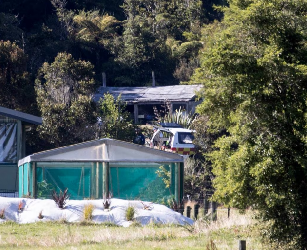 Fire investigators and police are at the scene of the house bus fire on Blue Spur Rd, Hokitika....