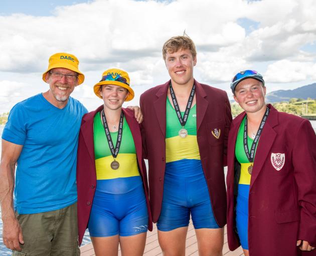 Dunstan Arm coach Simon Smith (left) is proud of rowers (from left) Elsie Talbot, Jack Pearson...