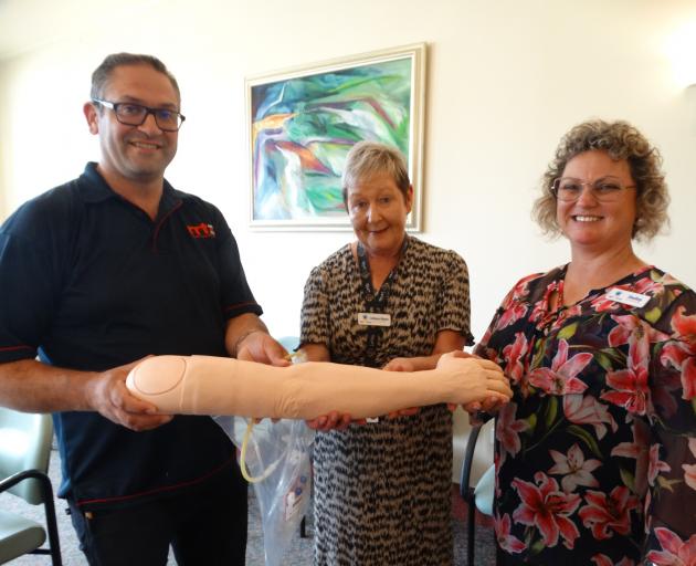 Celebrating the new "training arm" that was donated this week at Oamaru Hospital are (from left)...