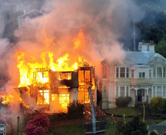 The former boarding house in Phillips St, was engulfed in flames. PHOTO: STEPHEN JAQUIERY