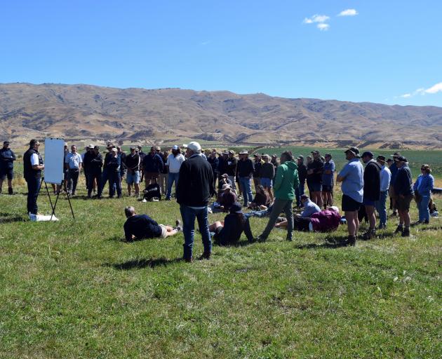 More than 80 people listen to veterinarian Dave Warburton speak about the benefits of hybrid...