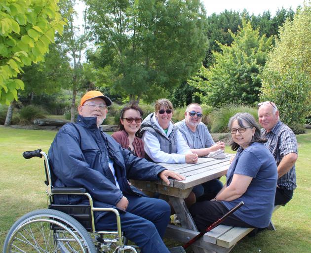 Ready to welcome all the family are the Party in the Park organising committee (from left): John...