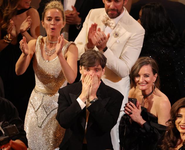 Cillian Murphy (centre) reacts as Oppeheimer is named best picture. The 47-year-old Irishman was...