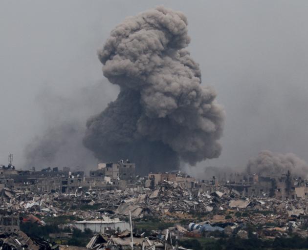 Smoke rises from Gaza, amid the ongoing conflict between Israel and the Palestinian Islamist...