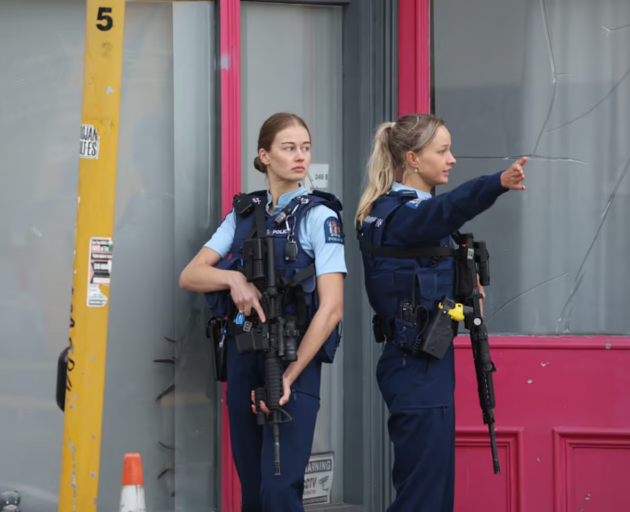 Armed police on the corner of Union and Hobson Sts, Auckland. Photo / Jason Oxenham